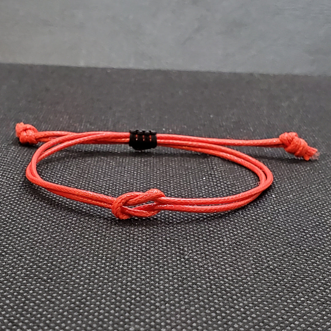 Bracelet en fil rouge unisexe