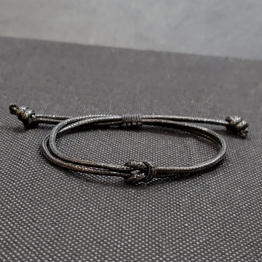 Bracelet en fil noir unisexe